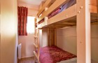 Chambre avec 2 lits simples superposés