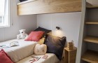 Chambre avec 3° lit escamotable dans le cottage Cap West 6P